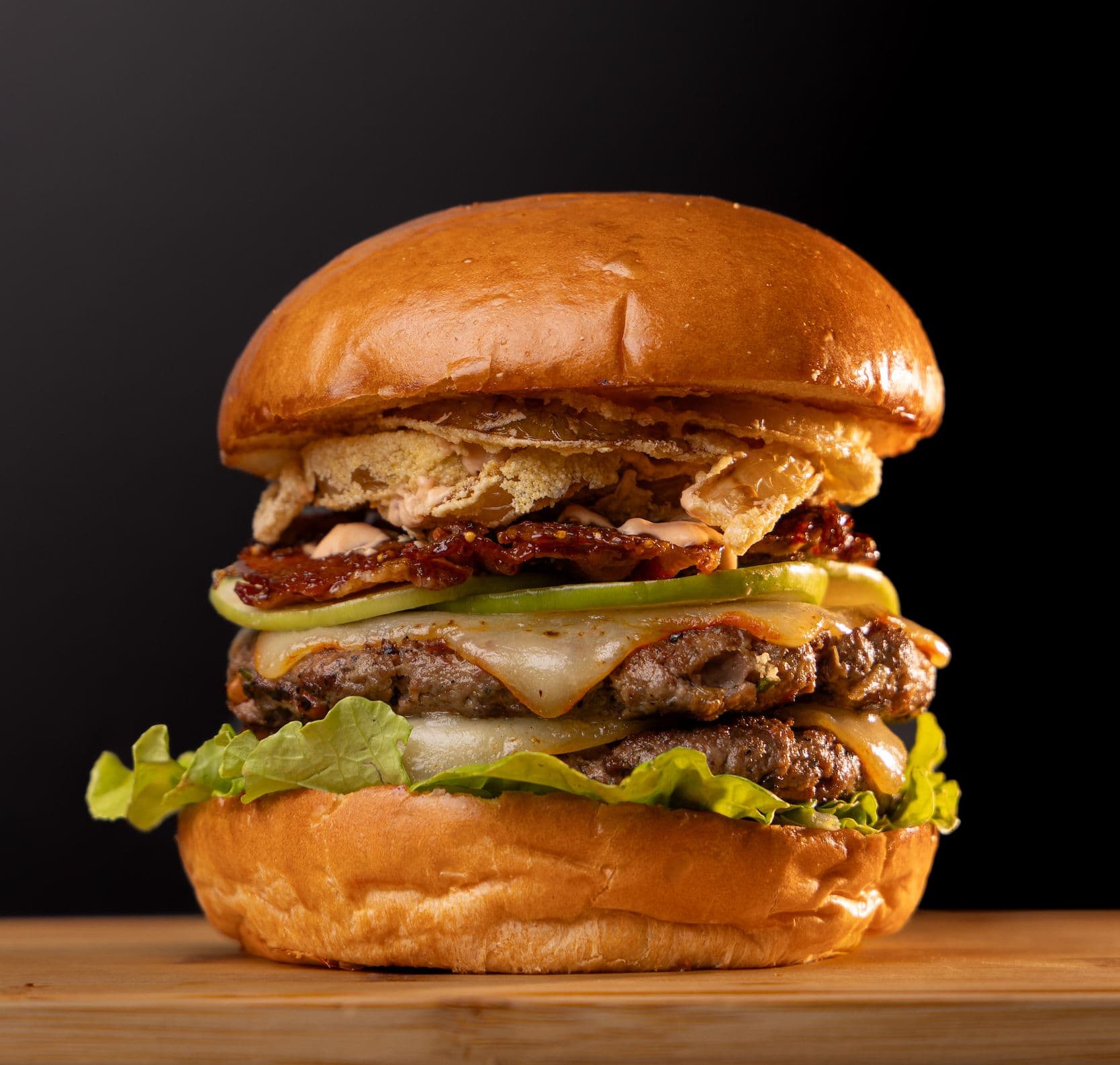 The Nomad's Flame Anchor and Den Grand Cayman Marriott